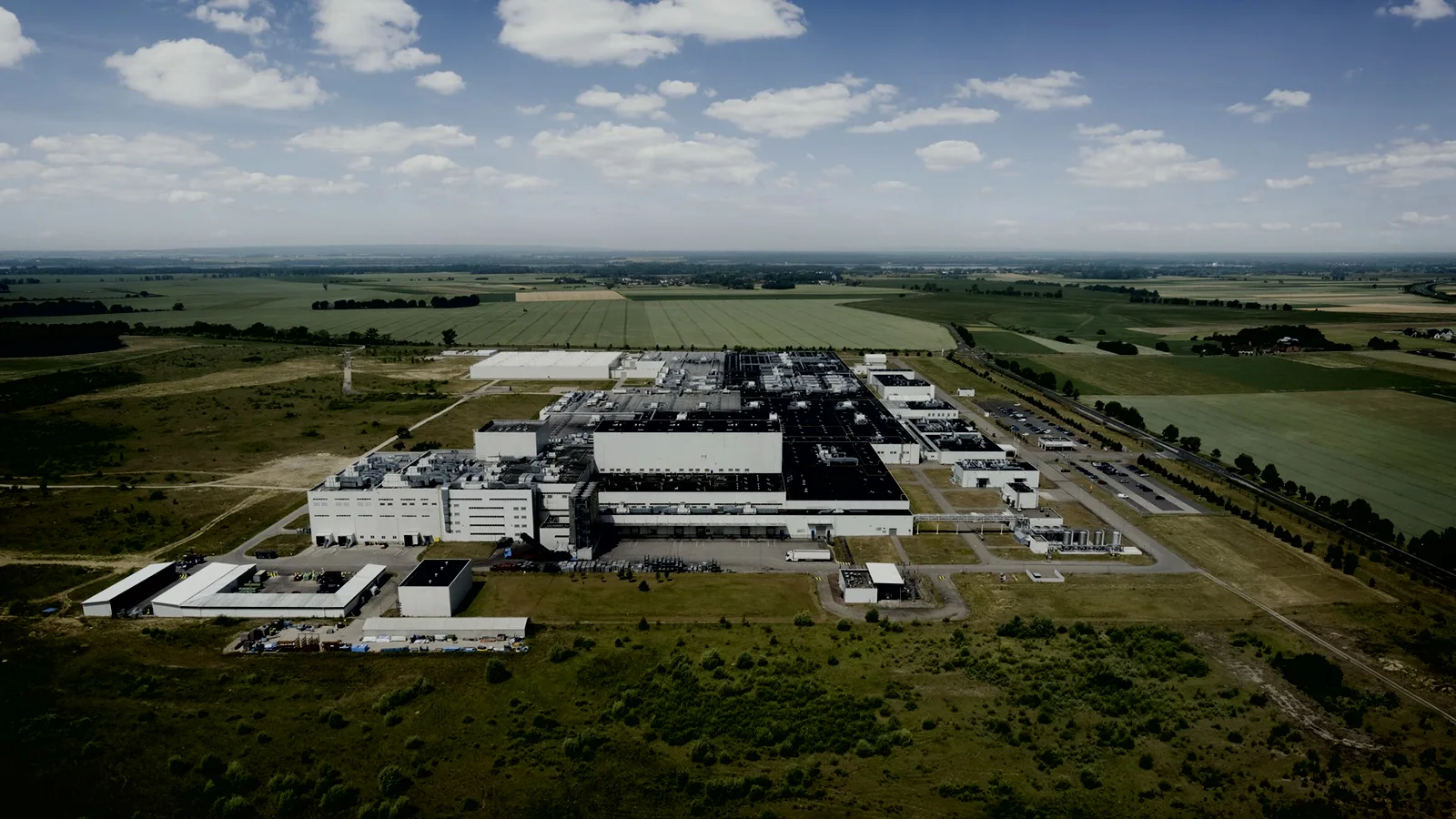A large industrial facility surrounded by fields in Poland